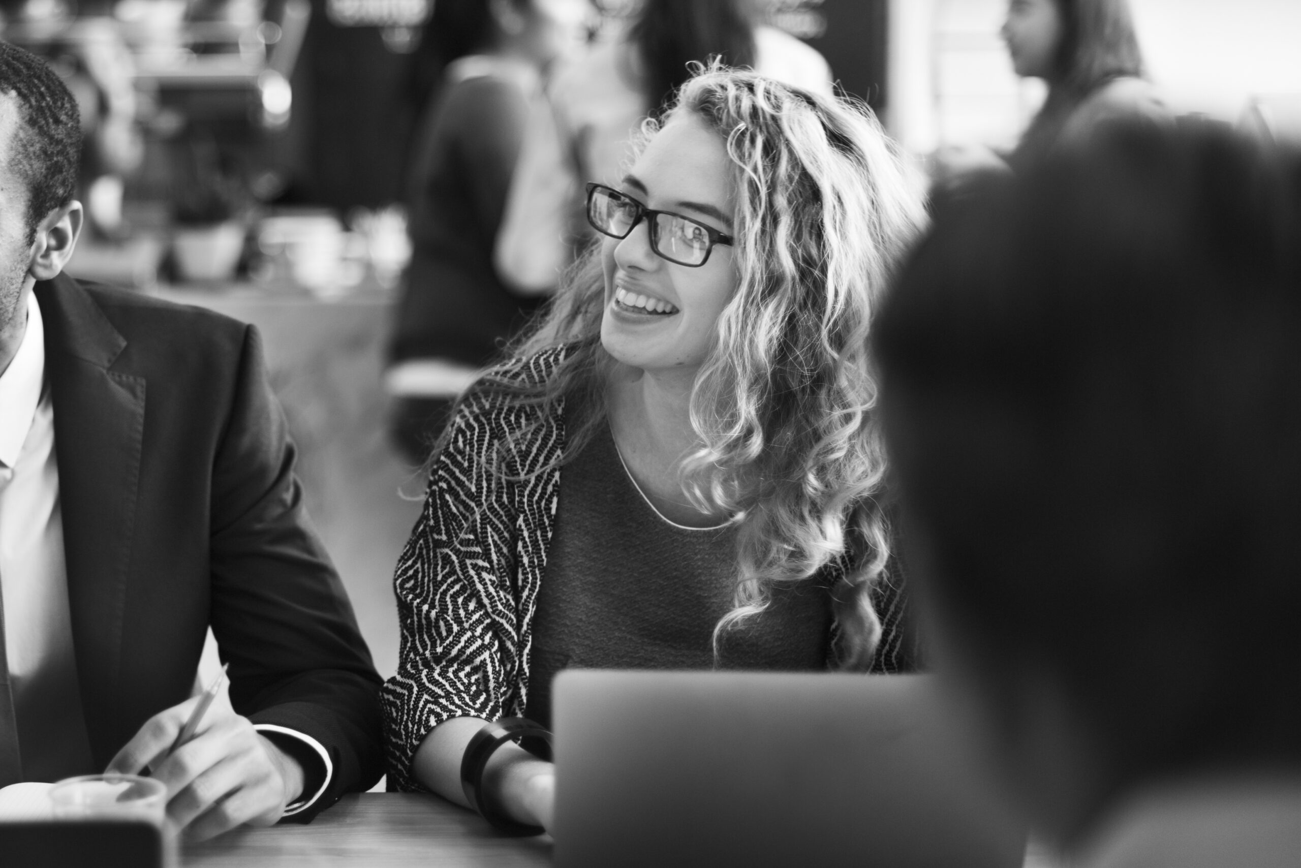 Closeup of businesswoman brainstorming grayscale